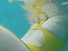 Japanese girl swim in pool with yellow swimsuit soft