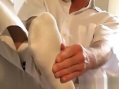 Gay feet wriggler takes socks off when masturbating solo