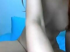 Asian webcam whore rubs her moist pussy