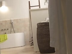 Bathroom unaware milf