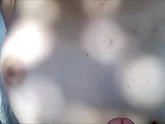 Outdoor quick risky handjob, cum on tits