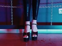 Slave Girl In Latex Catsuit In Electro-shock-heels